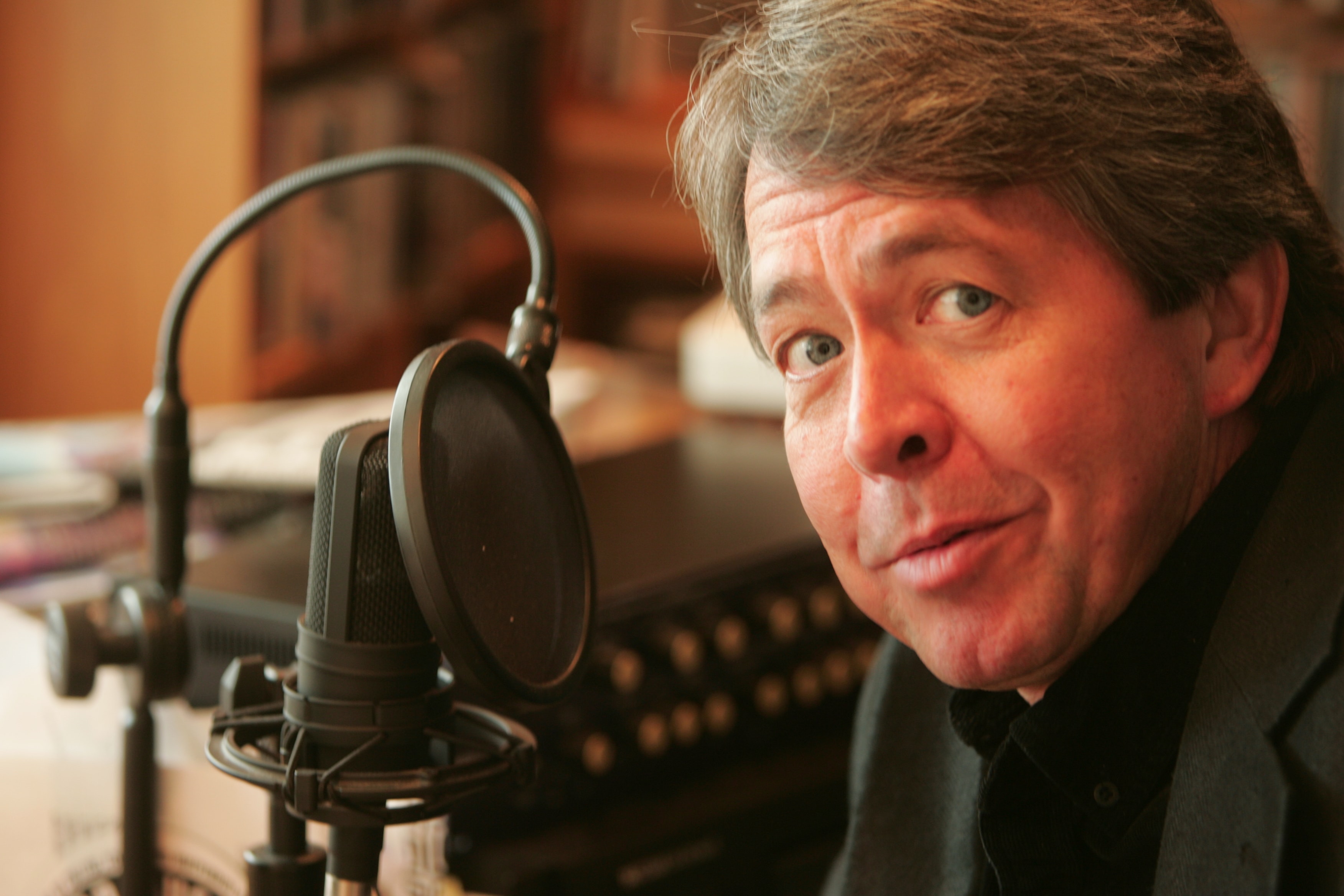 Dave Dugan at a studio microphone